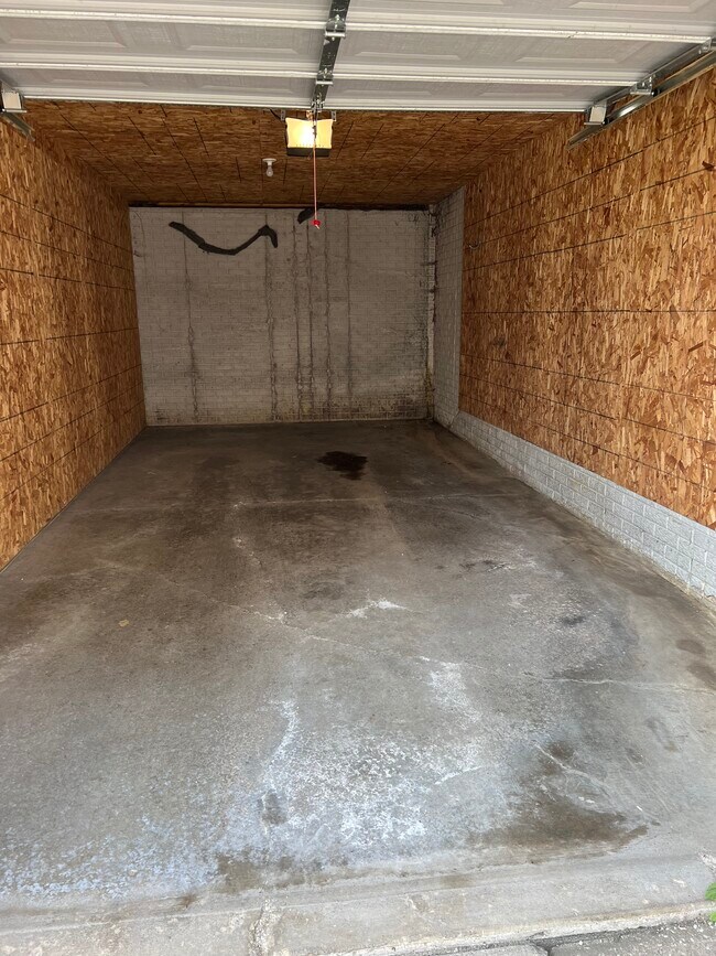 Large garage with extra storage.