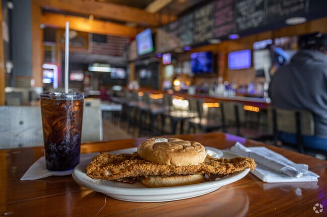 Watch a sports game and grab a bite at Devil Dog Saloon in Brackenridge.