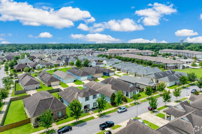 Rows of modern homes reflect Mouton’s redevelopment and expansion.