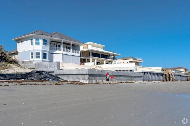This row of Ponce Inlet homes stays safe during hurricanes with shutters on their windows.