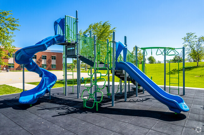 Students of different ages have their own section of the playground.