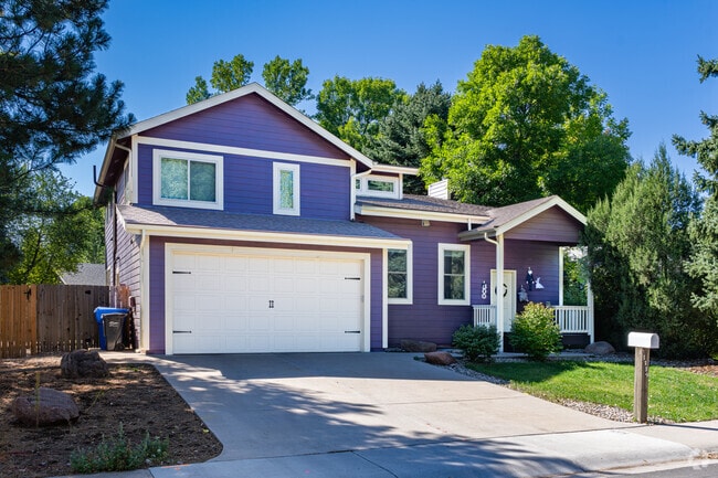 A Craftsman-style-inspired home has a moderate-sized yard and a two-car garage in Stonehenge.