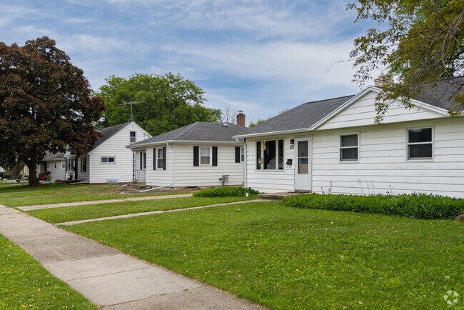 Ranch-style homes with clean lines and wide lawns define this stretch of Fox Crossing.