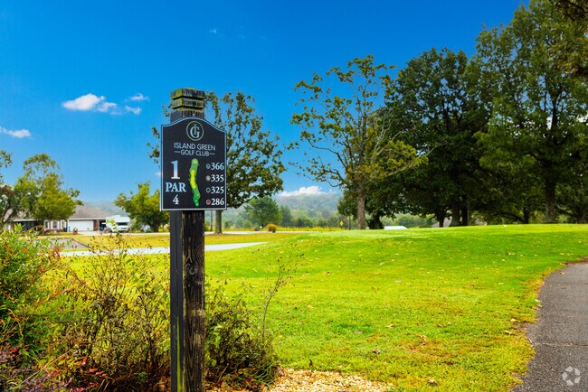 Island Green Golf Club offers rolling fairways and scenic views near the edge of Clever.