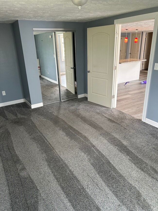 Carpeted bedroom
