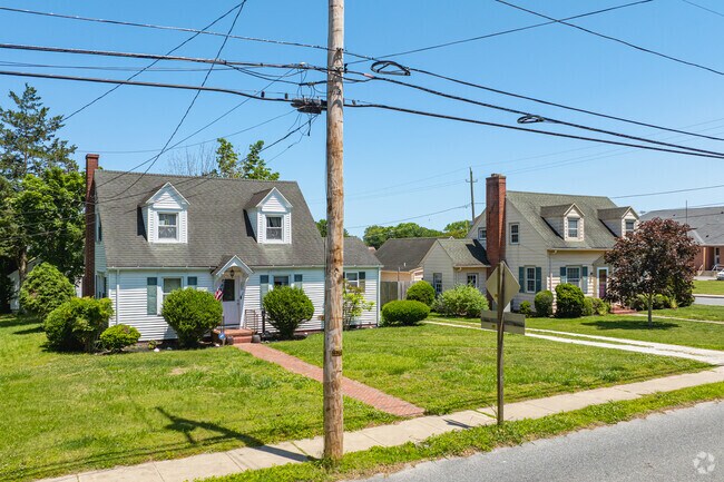 Charming Cape Cod homes with dormer windows adorn the streets of Snow Hill.