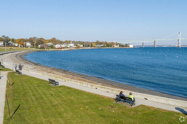 Stroll along the beach at East Ferry Memorial Park, with unobstructed waterfront views.