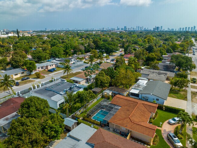 Aerial of residential area near ocean front condominiums and hotels in North Miami Beach.