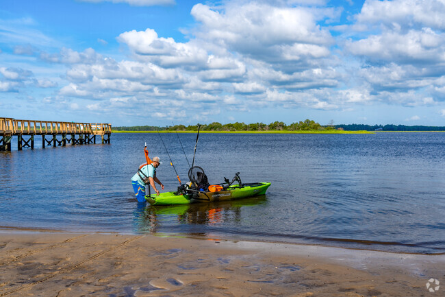 Residents get around Wilmington's waters by kayak along Cape Fear River.