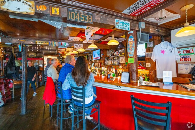 Dudley Chateau features a wraparound bar and local scene in Cochituate.