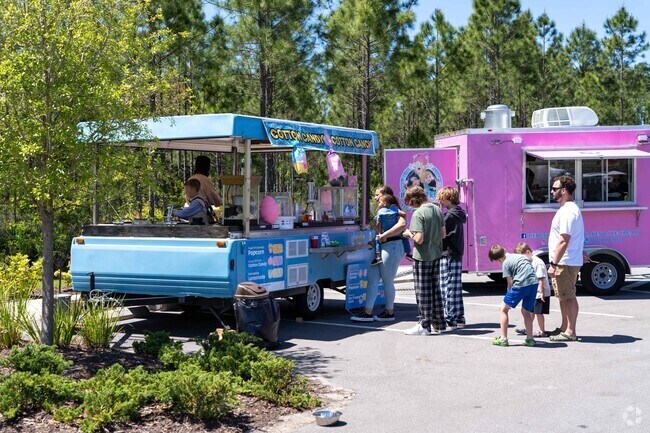 Kids love the to buy cotton candy at the Tributary Farmers Market.
