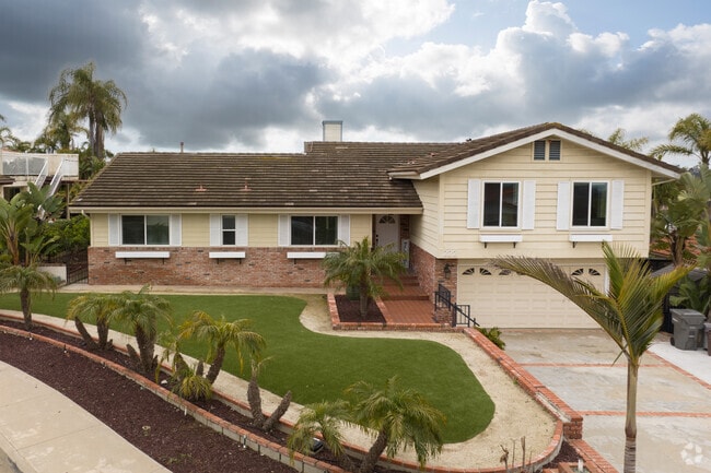 This Ranch style home has a large yard and two car garage in Vista Valley.