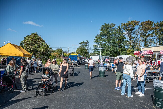 Friends gather and enter the West Islip County Fair.