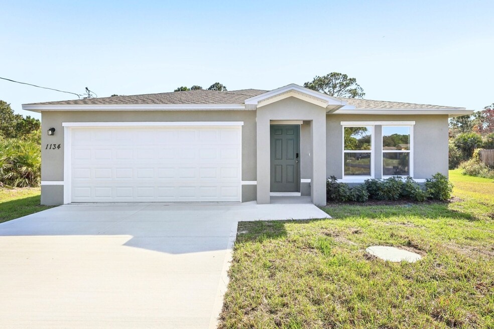 1134 Rabbit St SE, Palm Bay, FL 32909 - photo 1