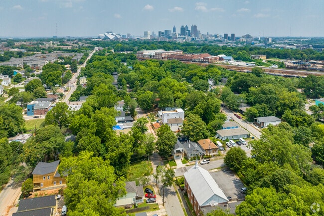 Aerial view of the Pittsburgh Neighborhood with a view of the train yard and Downtown Atlanta.