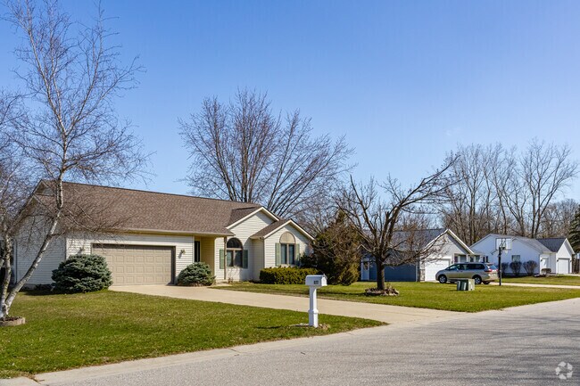 Contemporary ranch homes sit on quiet wooded lots in the north side of Hemlock.