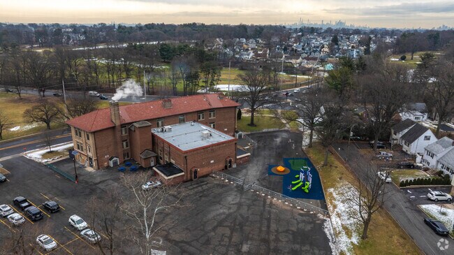 Belleville School No. 10 has a large courtyard and playground for students.