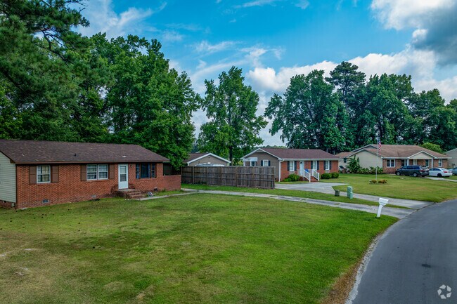 Pumpkin Center offers decent sized lots surrounded by mature trees.