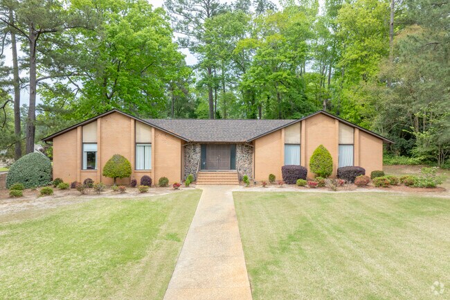 Brick ranch homes of various designs ensure each street has a unique look.