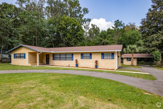 A beautiful orange midcentury brick ranch-style home in SE Ocala.