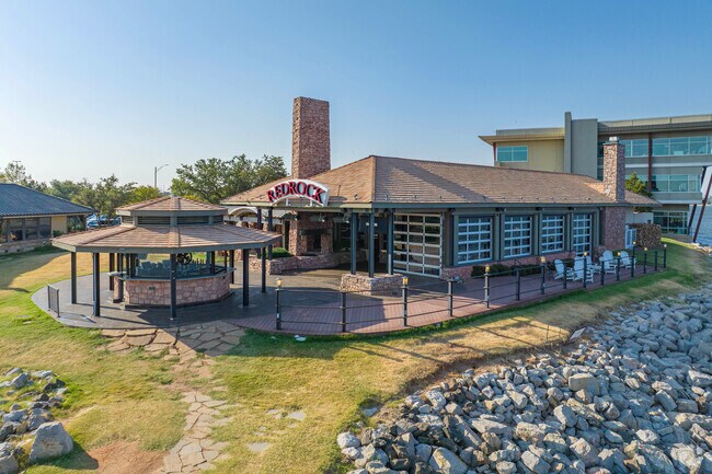 Grab a drink and appetizers lakeside at Red Rock Canyon Grill near the Mayview neighborhood.