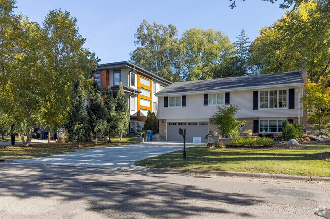 A split level house with a tuck under garage in the Minnehaha Woods neighborhood.
