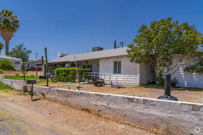 Many homes in Central Heights-Midland City feature modest ranch-style architecture with extended carports and large front lots.