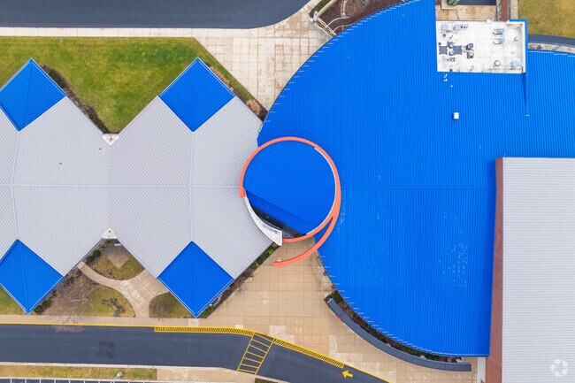 Ernest R Elliot Elementary School features a unique blue and red design.