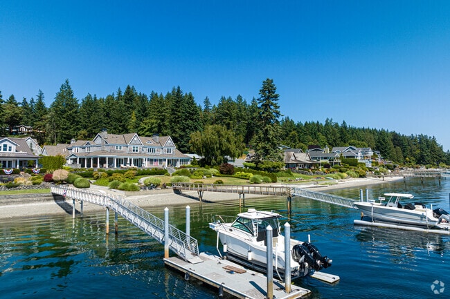 Private boats dock at the waterfront mansions on Fox Island.