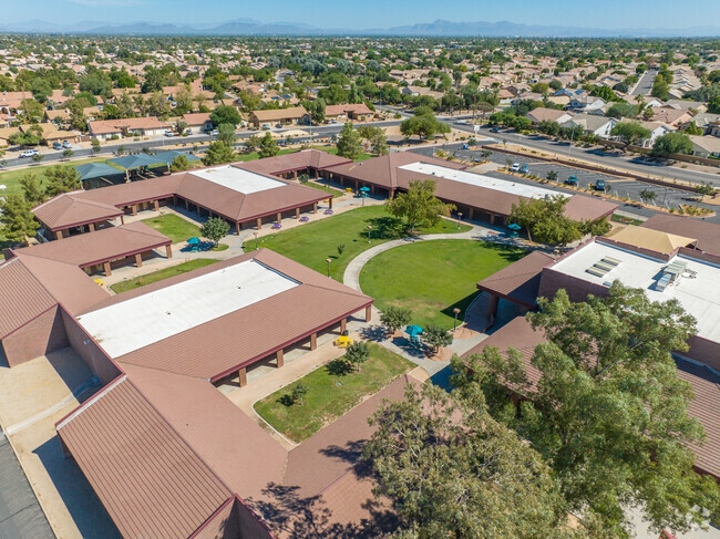 Sanborn Elementary School offers a large courtyard with plenty of green space.