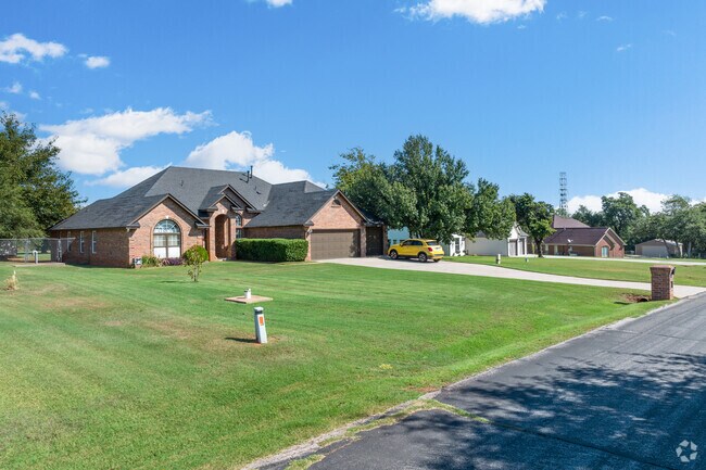 The winding roads and well-maintained houses make Forest Park a serene place to live.