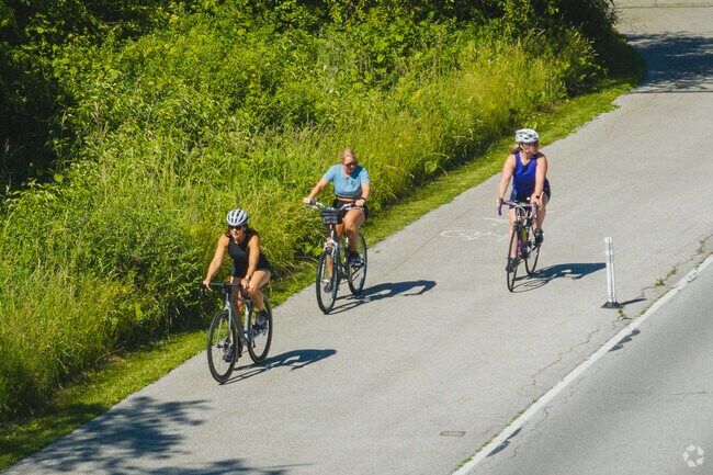 Bikers enjoy sunshine and a paved path at Fallen Timbers Battlefield Memorial Park in Monclova.