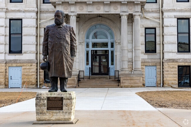 A statue of Marshalltown's founder, Henry Anson keeps watch over the city.
