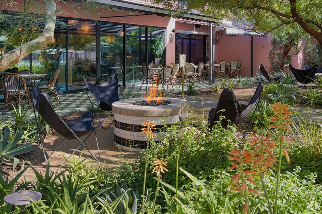 Sit on the patio and enjoy a glass of wine at The Pink Cabana.