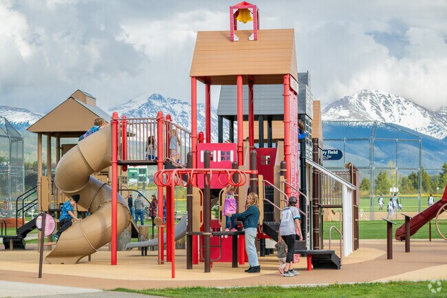 Children will enjoy the playground at Fraser Valley Sports Complex, along with its view of the mountains.
