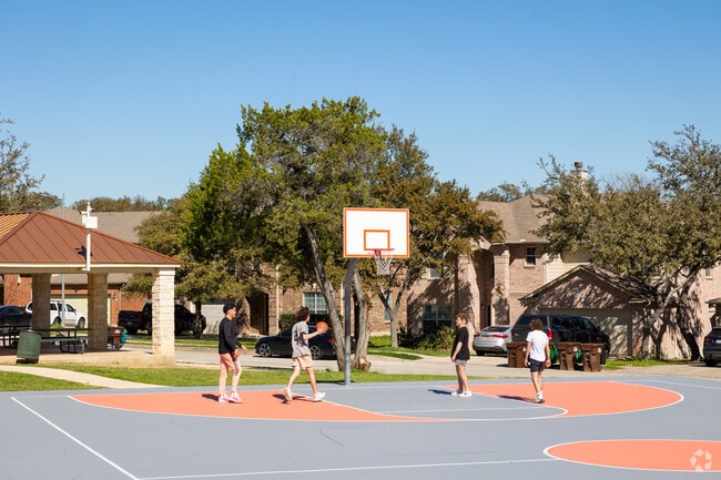 Shoot some hoops at the courts of Fox Grove Park.
