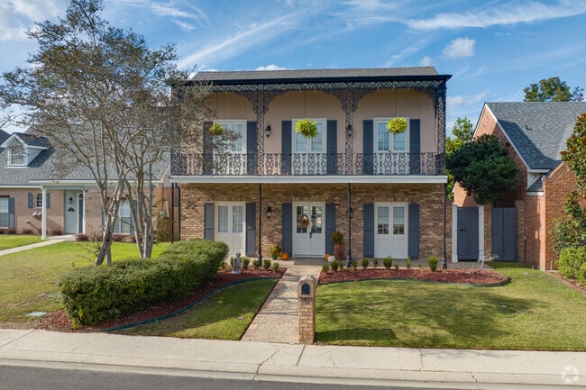 French influenced with 2nd level walkways between rooms are found throughout Bois De Lafayette.