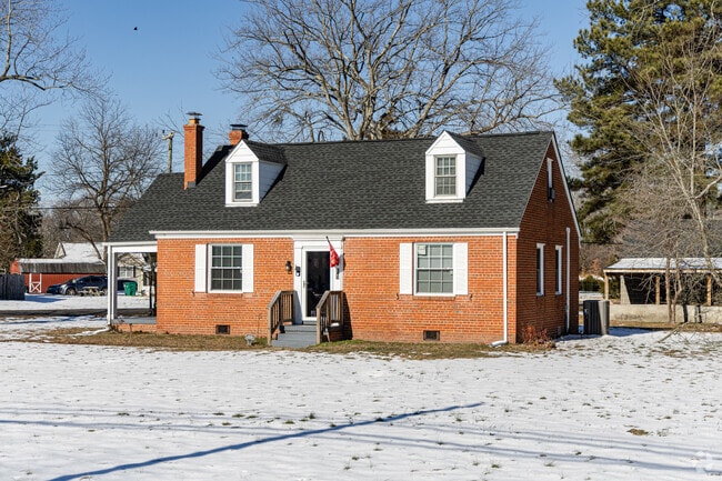 FInd the perfect Cape Cod home for your growing family in Highland Springs.