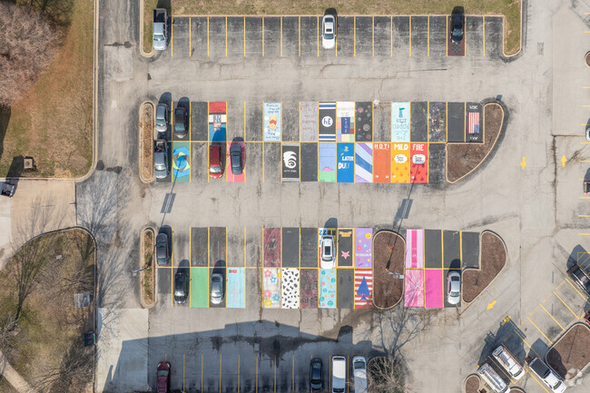 The seniors at Lutheran High School of St. Charles County paint their parking spaces.