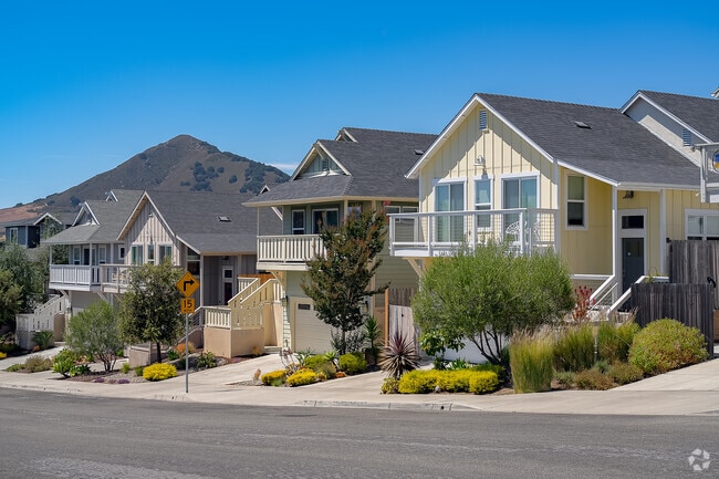 This row of newly built homes sits on a hill, offering mountain views in San Luis Obispo.