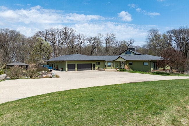 Several classic ranch homes can be found at the center of massive acreages in Onion Creek.