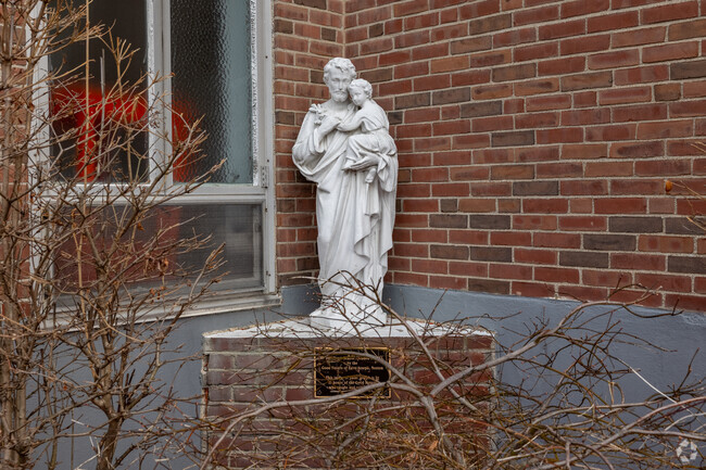 A brilliant statue rests just in front of Sacred Heart Elementary School in Weymouth.