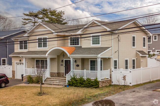 Here is a great Spanish Revival in West Hempstead.