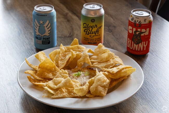 Order craft beer and crab dip at Erica Davis Lowcountry's seafood restaurant in Thunderbolt.