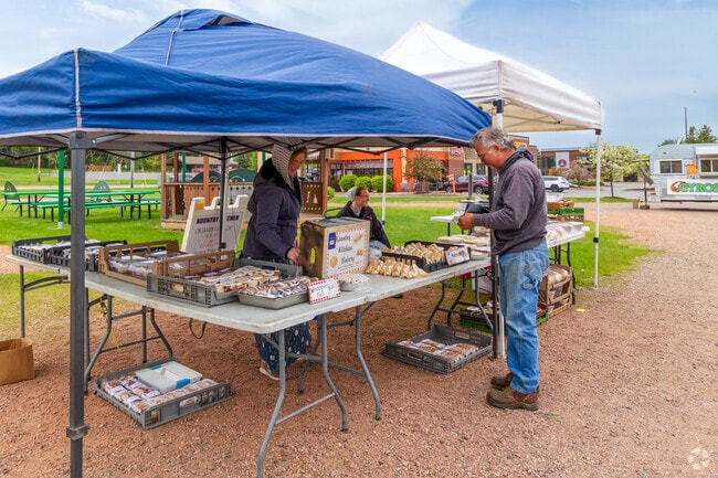 Locals shop homemade goods at the bustling Weston Farmers Market.