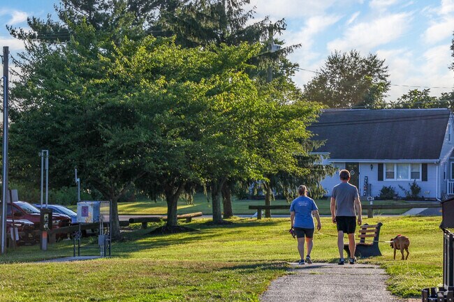 Locals get outside and walk the trails at Ella Harris Recreation Park for exercise.