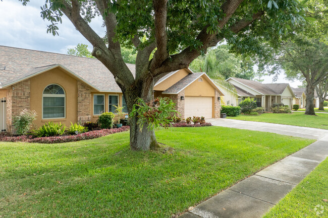 Groves features homes with stucco or brick-front facades.