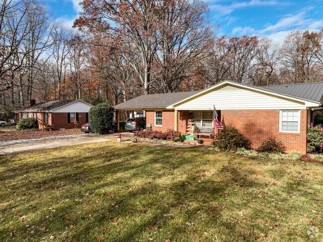 A row of brick ranch homes in Harmony.