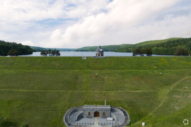 Saville Dam’s earthen wall holds back Connecticut’s largest reservoir.