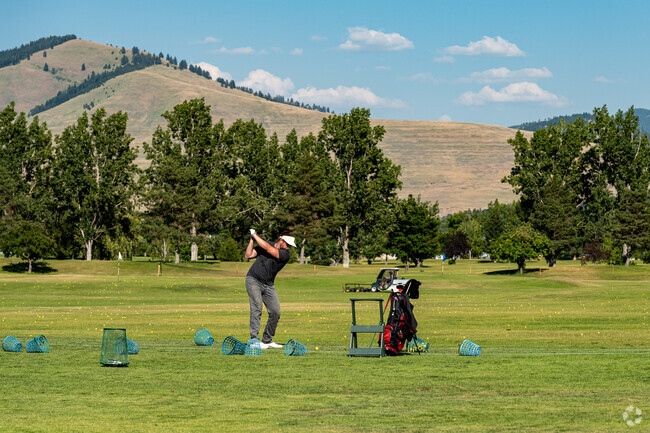 Enjoy scenic golfing at Larchmont Golf Course near Southgate Triangle.